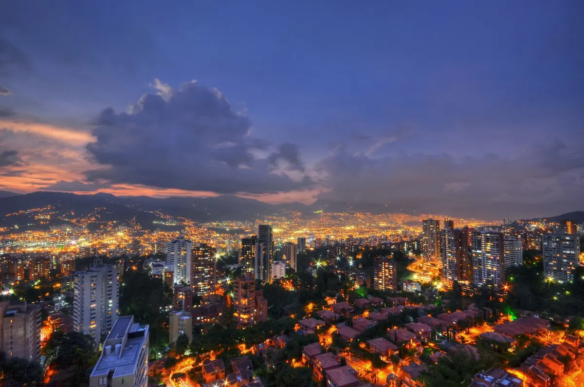 Medellín city buildings at sunset